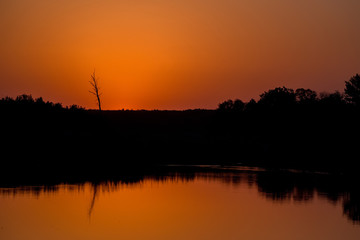 Fototapeta premium Sunrise landscape with steppe and river