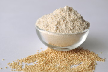 Amaranth seeds - alternative gluten-free grain flour for baking and cooking. Isolated on white. Front view
