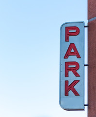 Park Sign on Side of Building