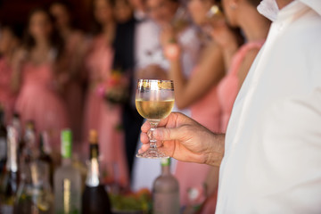 Glass with alcohol drink. Reception or banquet concept
