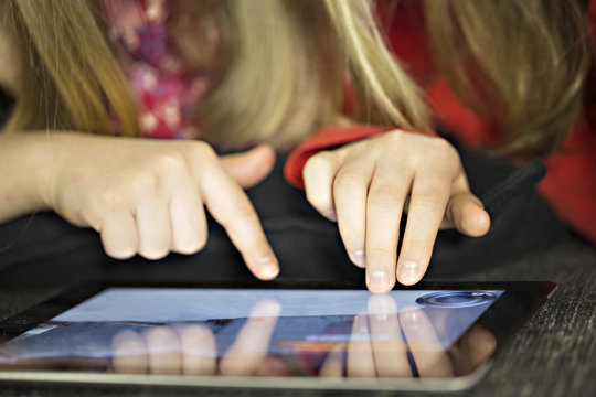Children using digital tablet, Osijek, Croatia, Europe