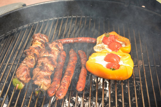 Sausages,meat and pepper on the barbecue grill