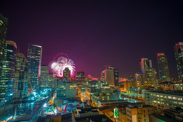 Fireworks over downtown San Francisco, California, USA.  Cityscape at Night.  Transbay terminal...