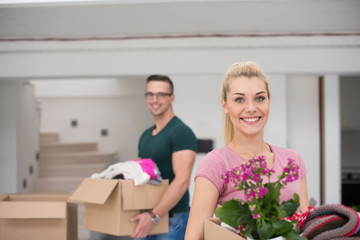 young couple moving into a new home