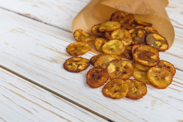 Homemade crispy Banana chips. Vegeterian and vegan concept.