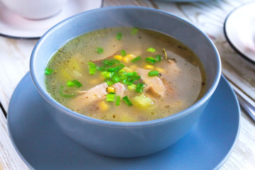 Traditional Nigerian corn and smoked chicken clear soup