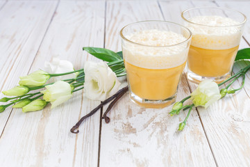 Traditional Homemade Eggnog and white eustoma flowers