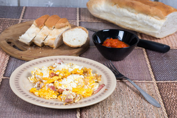 Breakfast table with fried eggs and bacon