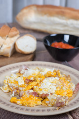 Breakfast table with fried eggs and bacon