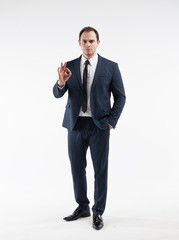 Fototapeta premium Portrait of a mature businessman on white background