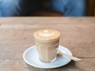 Coffee cup on a table.