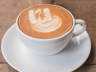 Coffee cup on a table.