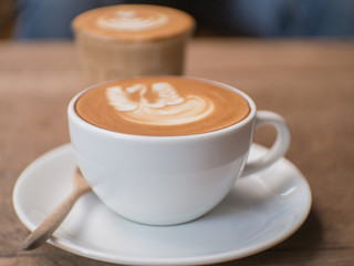 Coffee cup on a table.