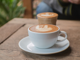 Coffee cup on a table.