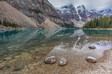 Fototapeta na wymiar Calm Morning at Moraine Lake in Banff National Park, Alberta, Canada. 