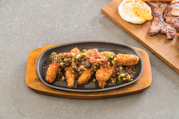 fried fish stick with spicy sauce