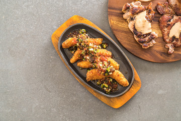 fried fish stick with spicy sauce
