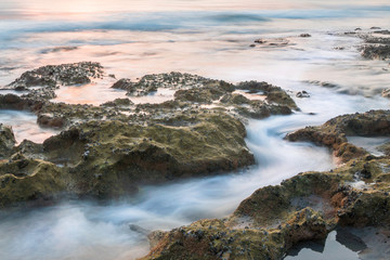 Beach Rocks with Water Flowing