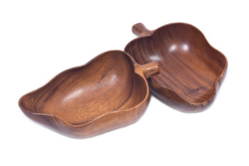 Vintage wooden bowl isolated on white background