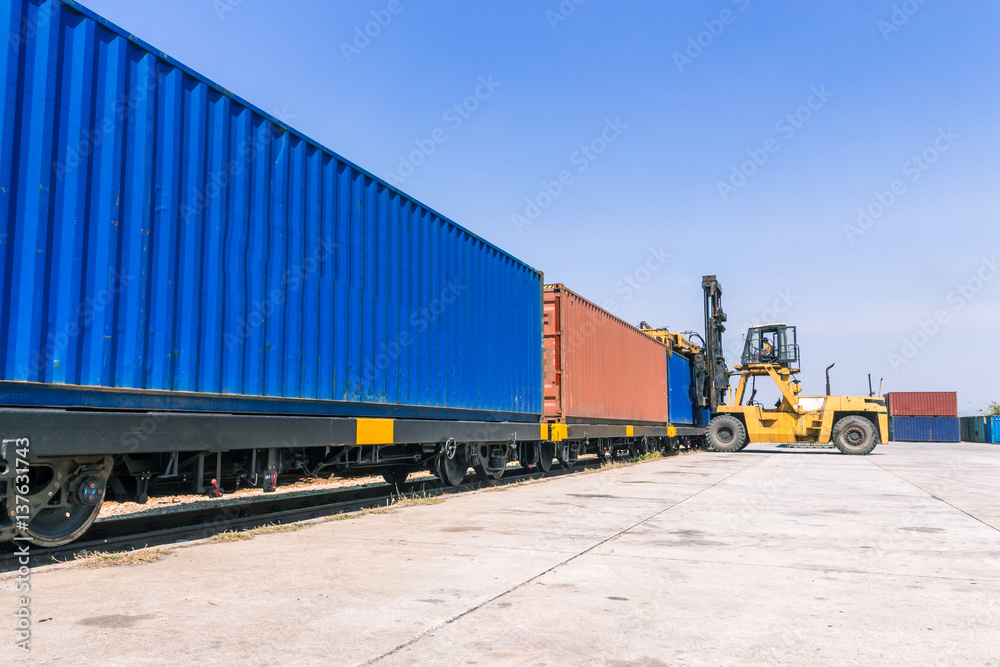 Wall mural forklift handling container box loading at the docks with truck