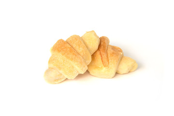 Mini croissants isolated on white background.