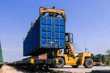 Forklift handling container box loading at the Docks with Truck