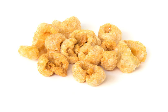 Pile of pork rind isolated on white background.