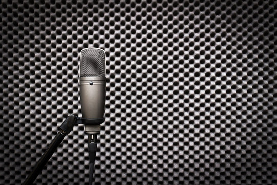 condenser microphone in recording studio for music background