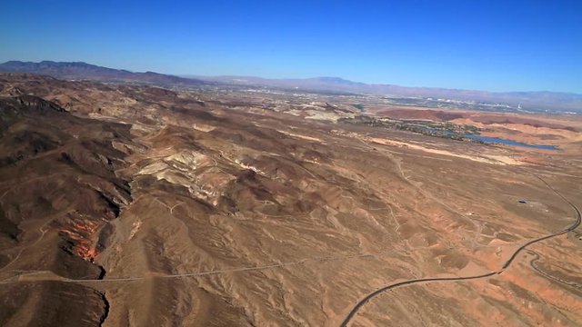 Aerial of The Mojave Desert,  mostly high desert area, that occupies a significant portion in the United States. Las Vegas is in  the Background.