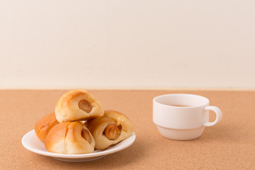 Sausage mini bun serve with tea