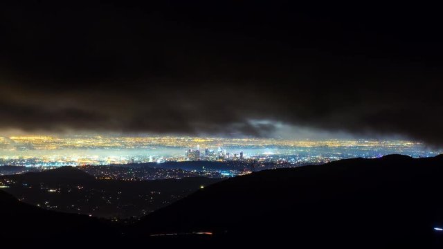 Timelapse of Storm Clouds over Los Angeles City Lights -Zoom In-