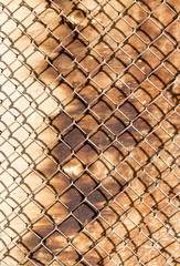 metal mesh on the wood background