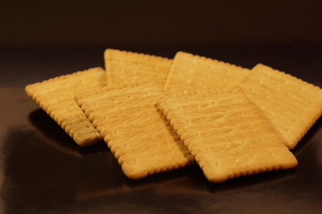 sweet crackers are isolated on a black background