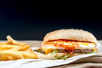 Cheese burger - American cheese burger with Golden French fries