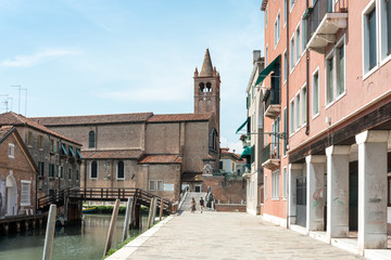 Fototapeta premium VENICE, ITALY - June 30, 2016.street view of old buildings in Venice. its entirety is listed as a World Heritage Site, along with its lagoon.June 30, 2016, VENICE, ITALY