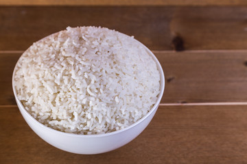 boiled rice in white bowl close up