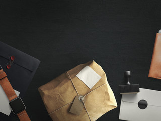 Workspace composed of postal parcel with envelope