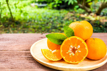 Orange juice on a wooden table
