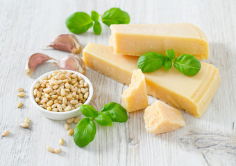 pesto ingredients on wooden surface
