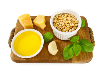 pesto ingredients on wooden surface