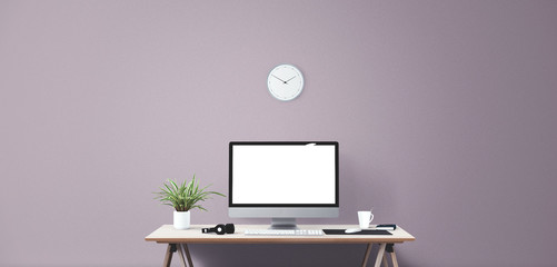 Computer display and office tools on desk. Desktop computer screen isolated. Modern creative workspace background. Front view