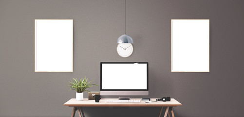 Computer display and office tools on desk. Desktop computer screen isolated. Modern creative workspace background. Front view