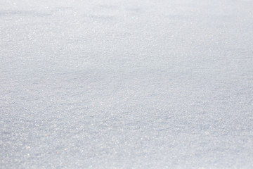texture of snowdrifts in a soft diffused sunset light.