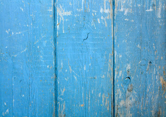 Fototapeta na wymiar Wooden background blue. The old painted wall. The texture of wood planks. Retro pattern.