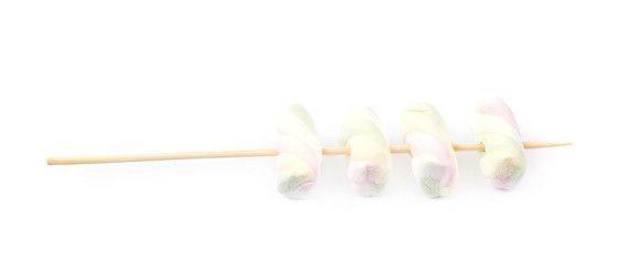 Fototapeta na wymiar Multiple marshmallows on a stick
