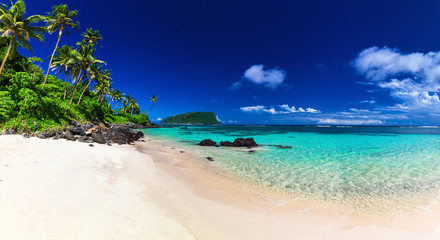 Panorama of Lalomanu beach on Samoa Island with coconut palm trees