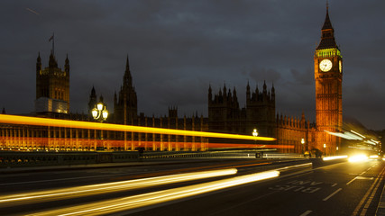 Fototapeta na wymiar LONDON, UK - APRIL: Traffic and pedestrians on Westminster Bridge near Big Ben and Parliament
