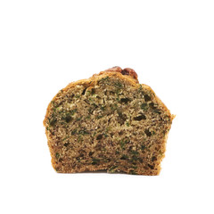 Half of a pecan nut muffin isolated