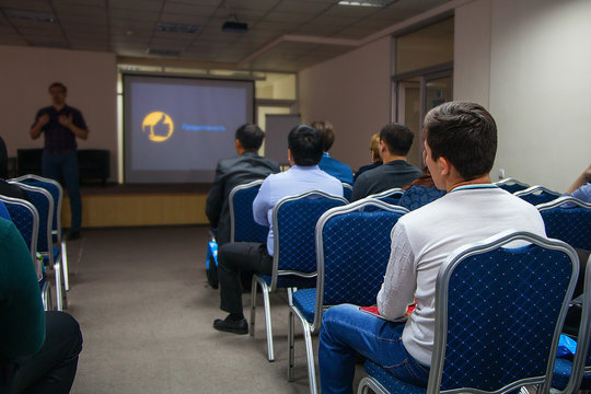 The image of a conference in a conference hall
