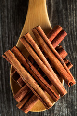 Cinnamon sticks spice on rustic background